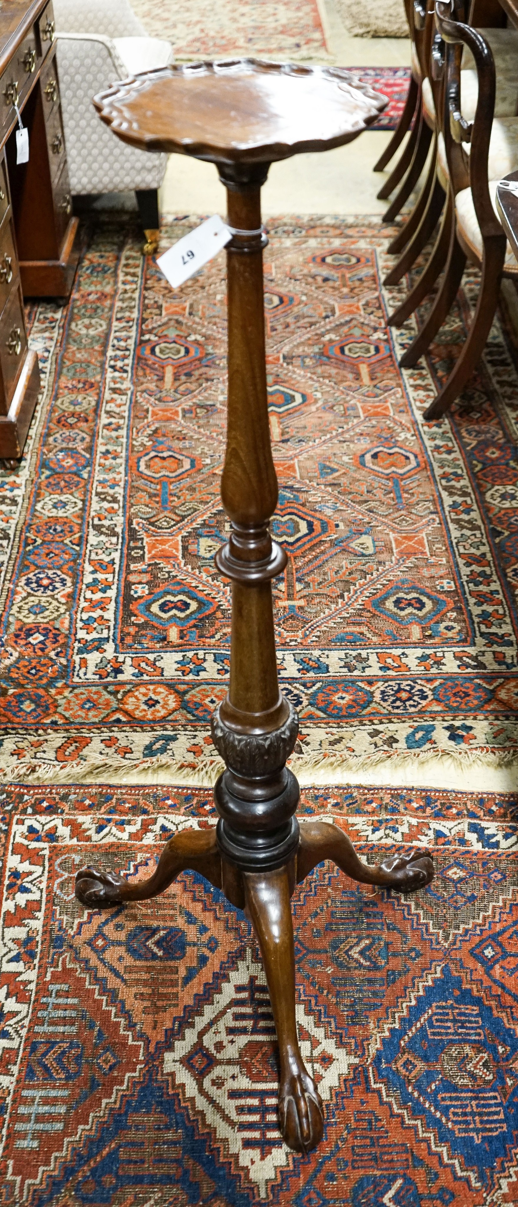 A Chippendale revival mahogany tripod torchere, height 113cm together with a Victorian mahogany toilet mirror